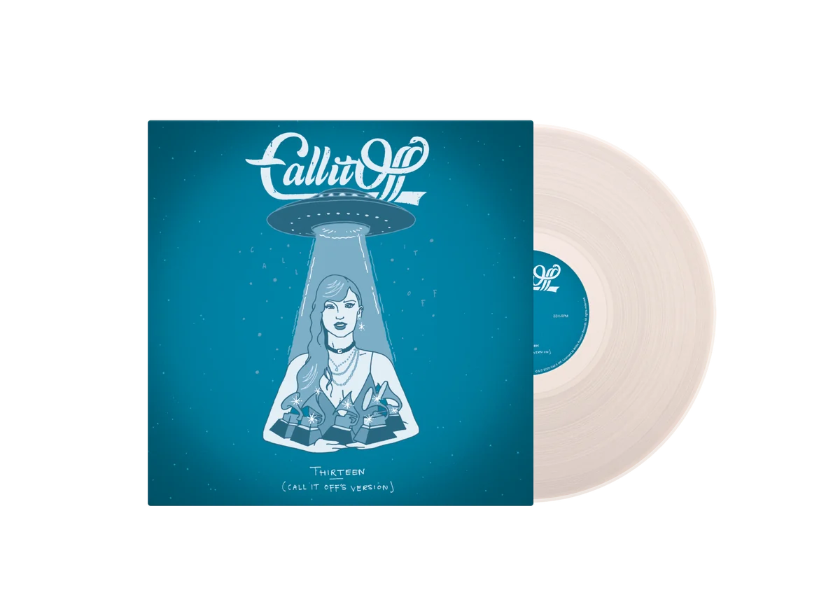 Thirteen blue cover sleeve beside the milky clear vinyl